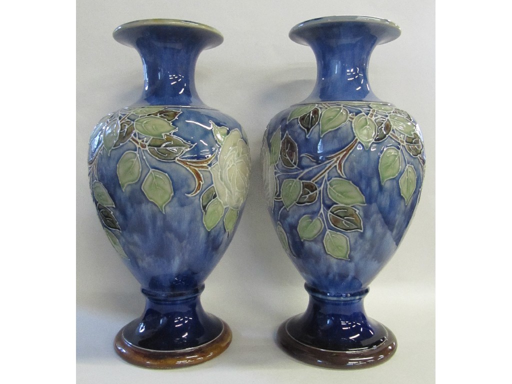 Appraisal: Pair of Doulton vases decorated with roses drilled for lamps