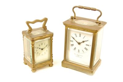 Appraisal: A French miniature gilt brass carriage clock with a platform