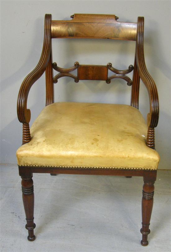 Appraisal: Regency mahogany bar back open armchair with reeded scrolling arms