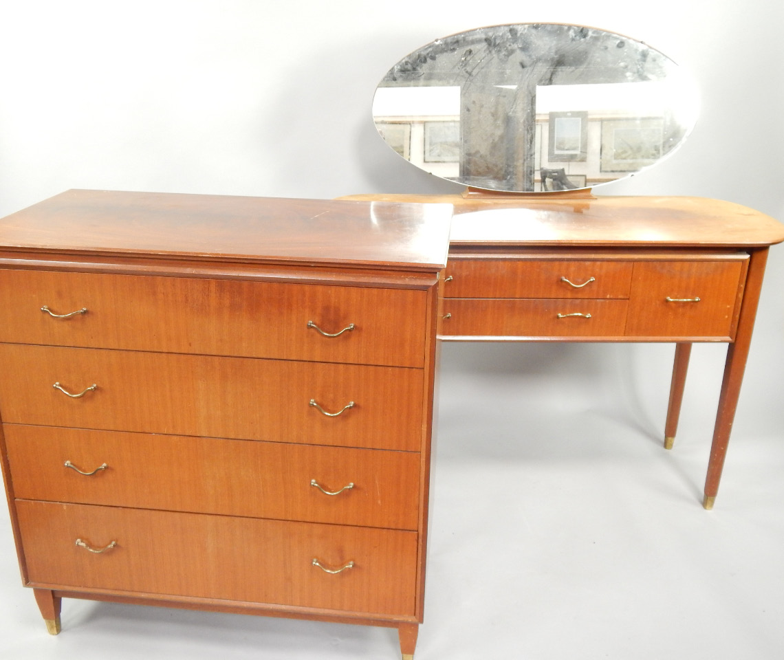 Appraisal: A 's Vesper mahogany dressing table and matching chest of