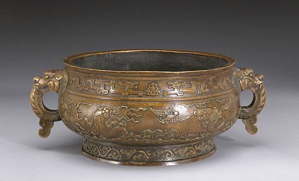 Appraisal: A cast bronze censer Xuande Mark th th Century Of