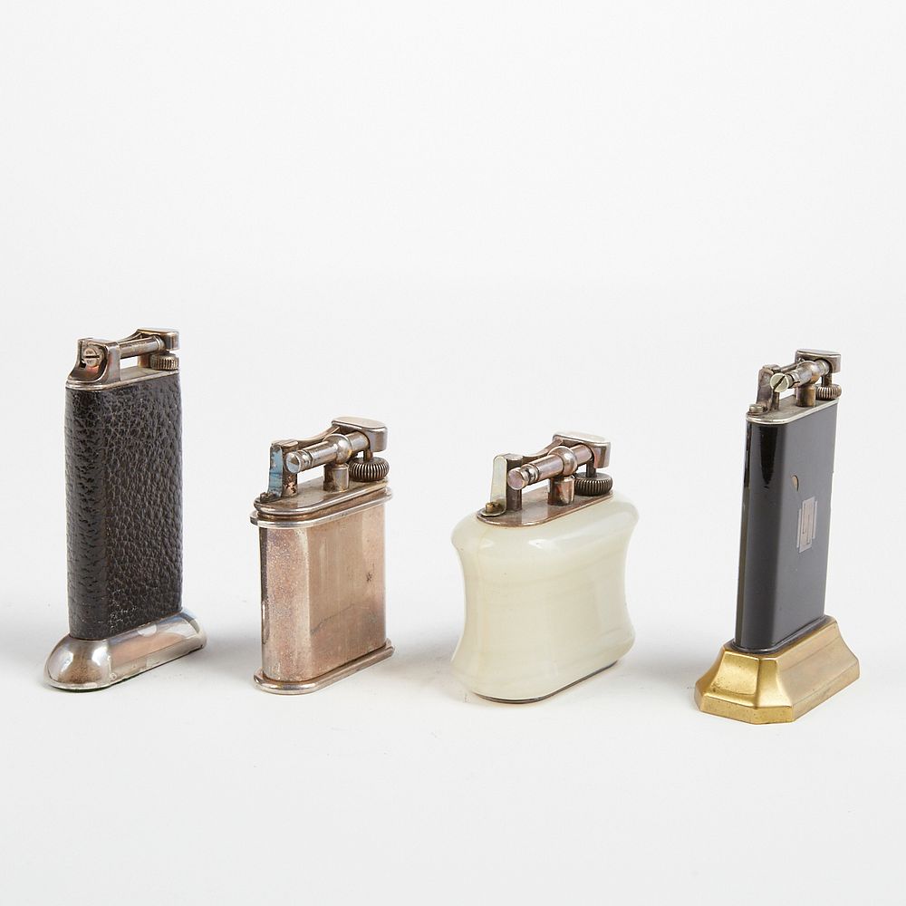 Appraisal: Grp Dunhill Lift Arm Unique Table Lighters Dunhill United Kingdom