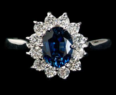 Appraisal: Sapphire diamond ring central oval cornflower blue sapphire estimated weight