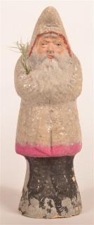 Appraisal: German Paper Mache Belsnickle White coat with red and pink