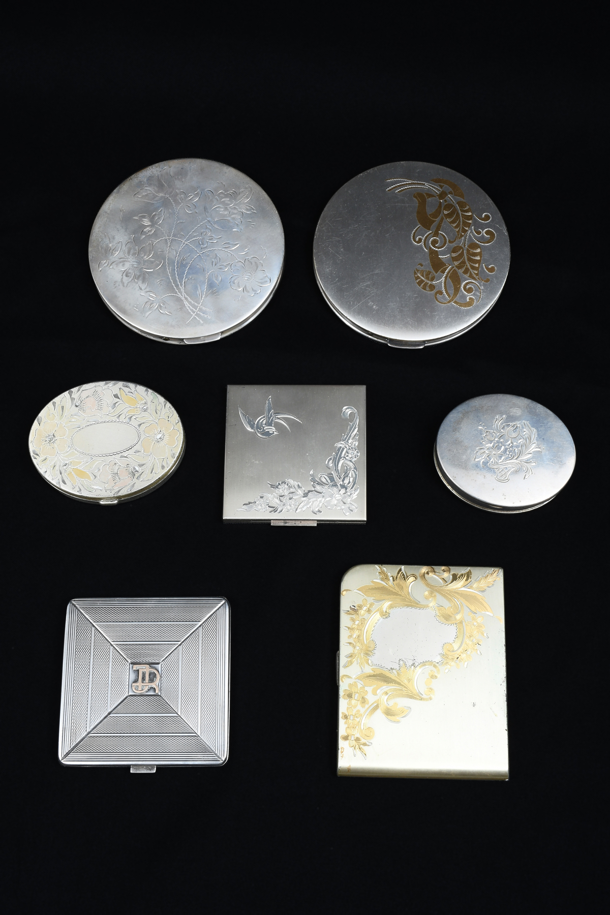 Appraisal: PC STERLING SILVER COMPACTS All having etched floral foliate motifs