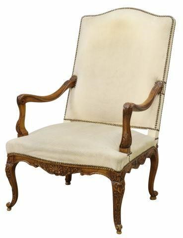 Appraisal: French Louis XV style fruitwood armchair th c padded and