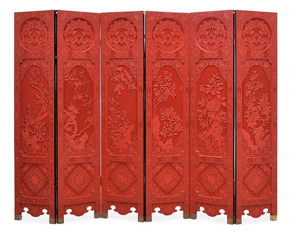 Appraisal: A CHINESE RED LACQUER AND CARVED SIX PANEL SCREEN TH