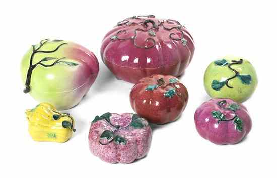 Appraisal: Seven Chinese Ceramic Fruit Form Articles comprising two boxes with