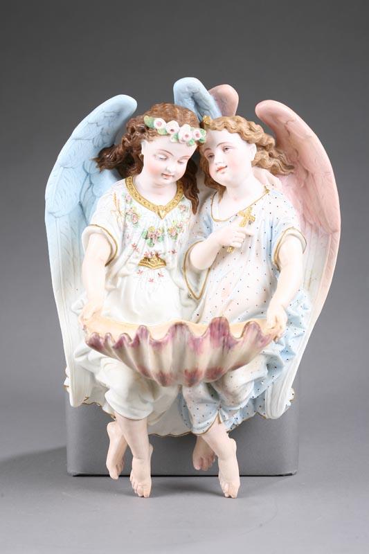 Appraisal: BISQUE WALL POCKET Two angels holding a seashell h