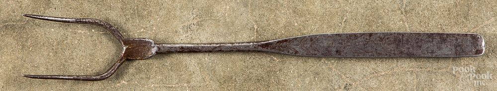 Appraisal: Wrought iron flesh fork th c Wrought iron flesh fork