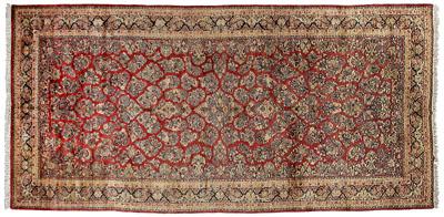 Appraisal: Sarouk rug repeating floral bouquets on burgundy red ground floral