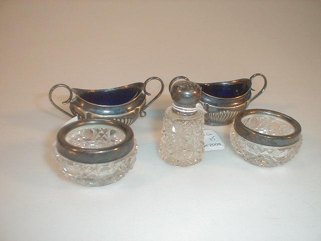 Appraisal: A pair of Edward VII cut glass salts with silver