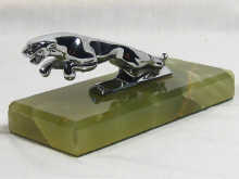 Appraisal: A Jaguar car mascot casting number WBB on a stone