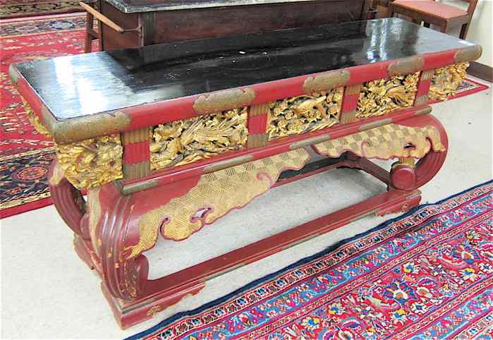 Appraisal: RED LACQUER AND CARVED GILTWOOD CONSOLE TABLE Chinese late th