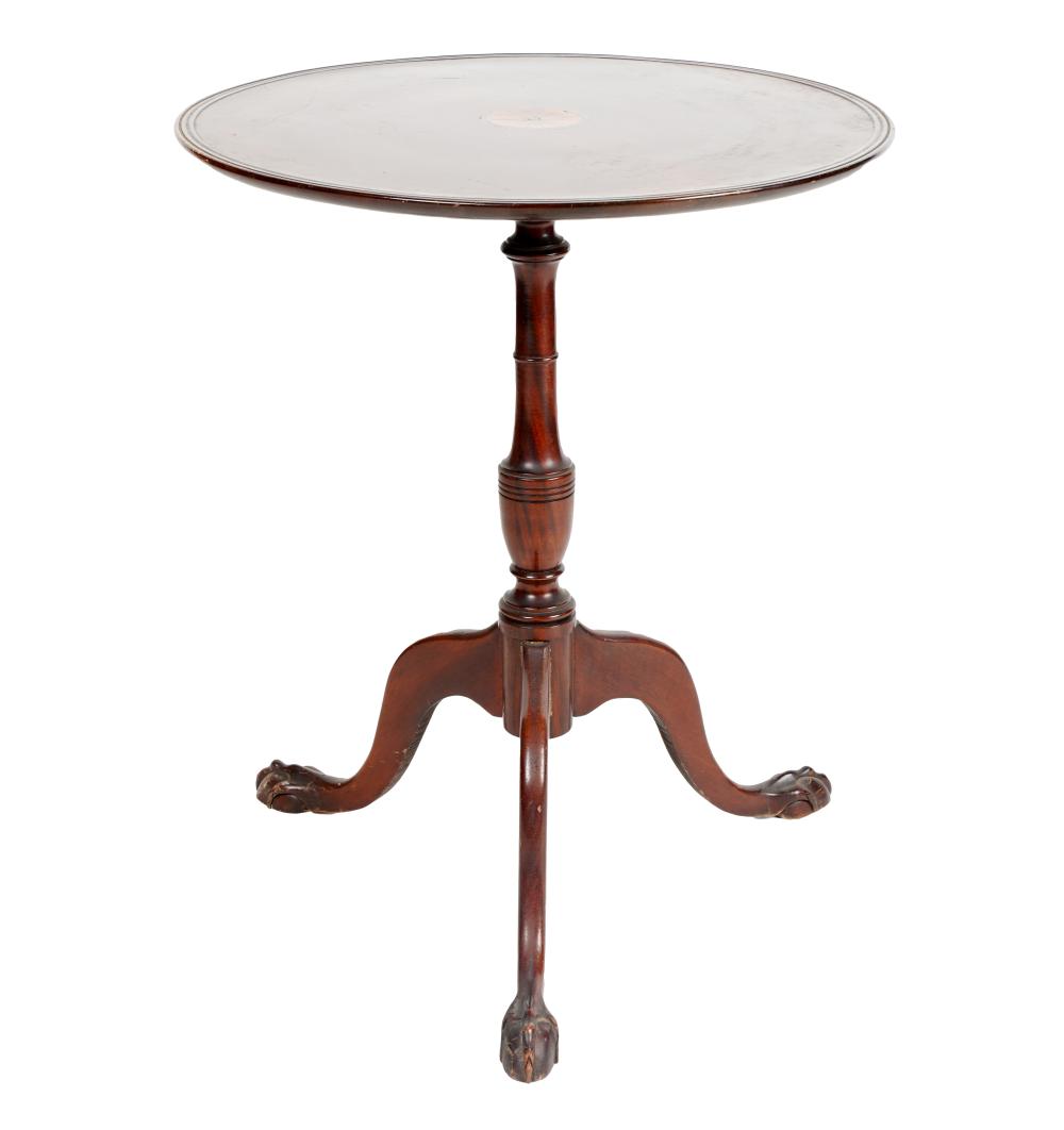 Appraisal: MAHOGANY TILT-TOP TRIPOD TABLEthe top centered by a marquetry medallion