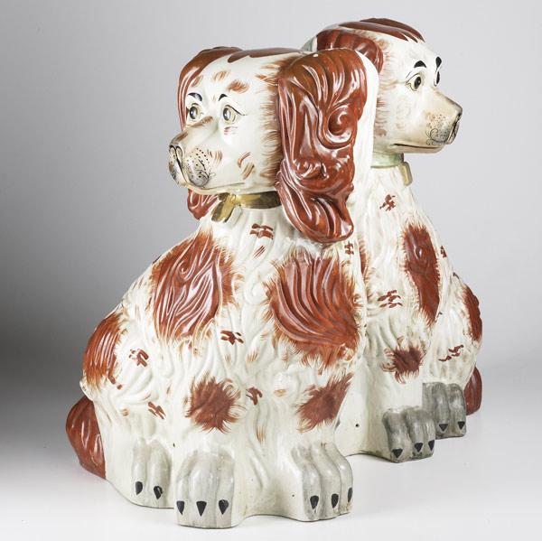 Appraisal: STAFFORDSHIRE Monumental pair of spaniels th C Impressed mark on