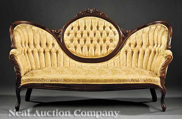 Appraisal: An American Carved Walnut Parlor Suite comprising a sofa side