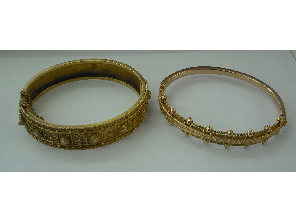 Appraisal: Edwardian gold hinged bangle with applied filigree work decoration gm