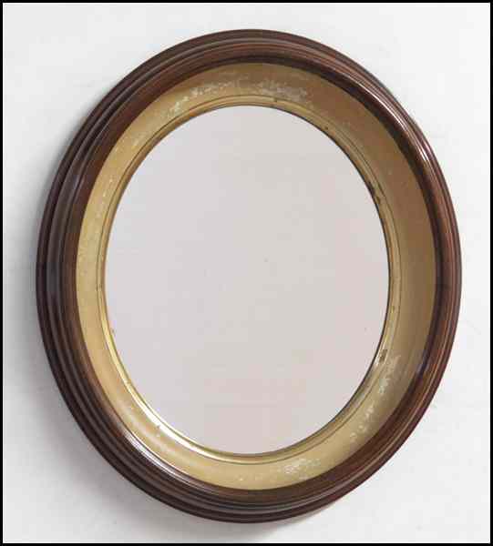 Appraisal: ENGLISH MAHOGANY OVAL MIRROR '' x '' Condition No Specific