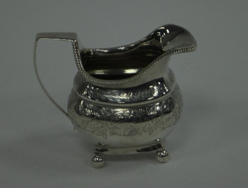 Appraisal: A George III silver jug London decorated an engraved band