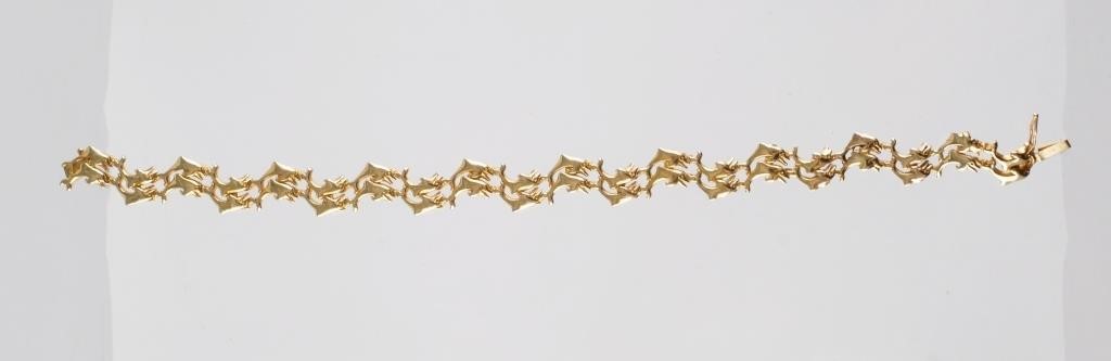 Appraisal: Gold dolphin bracelet total weight g inches long and inch