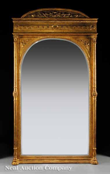 Appraisal: A Pair of Louis XVI-Style Carved Giltwood Pier Mirrors arched