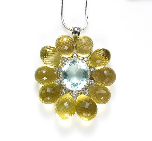 Appraisal: A citrine aquamarine and diamond pendant with chain centering an