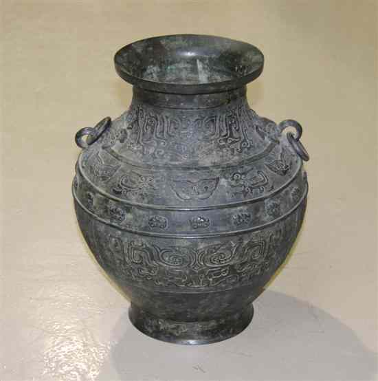 Appraisal: A Chinese Bronze Vessel having archaic decoration in relief throughout