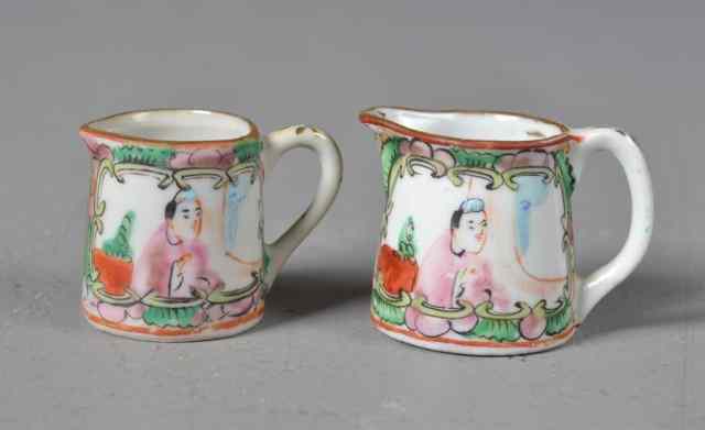 Appraisal: Miniature Chinese Export Cream JugsBoth painted in the famille rose