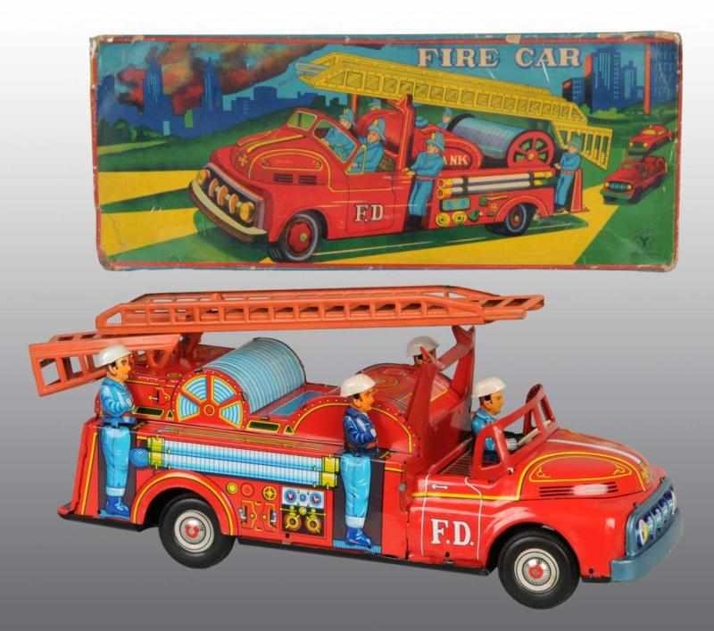 Appraisal: Tin Fire Engine Friction Toy Description Japanese Working Made by