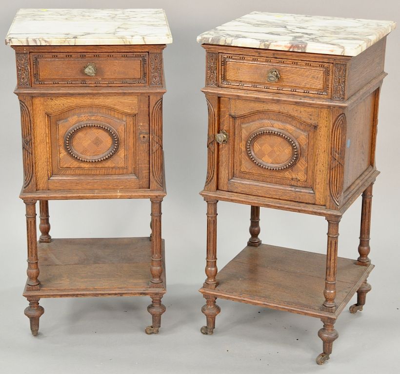 Appraisal: Pair of marble top oak stands ht in top x