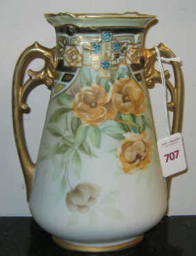 Appraisal: NIPPON DOUBLE HANDLED VASE Having gilt highlights relief decorated near