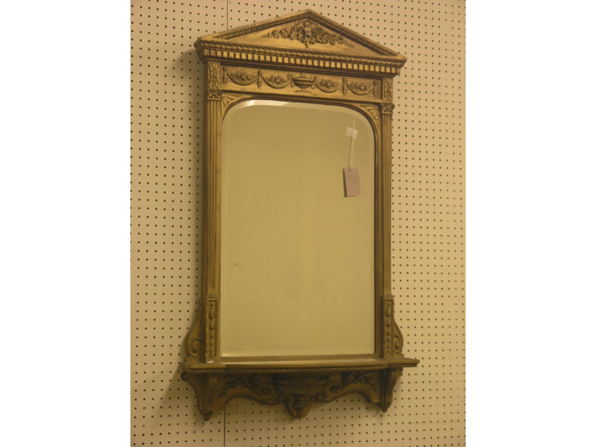 Appraisal: A Regency-style gilt pier glass architectural form moulded in neo-classical