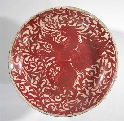 Appraisal: A William de Morgan ruby lustre charger painted with a