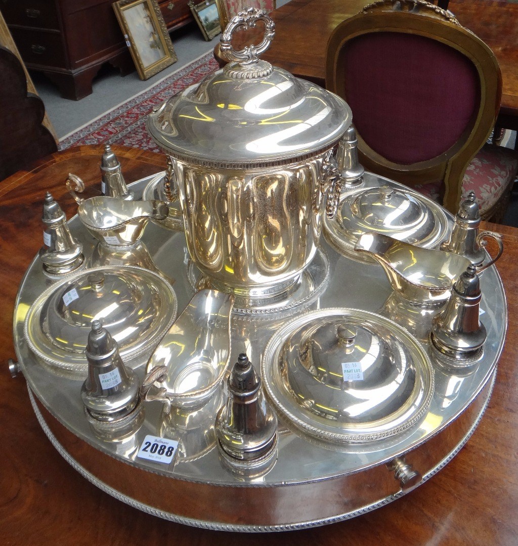 Appraisal: A silver plated lazy Susan of circular rotating form the