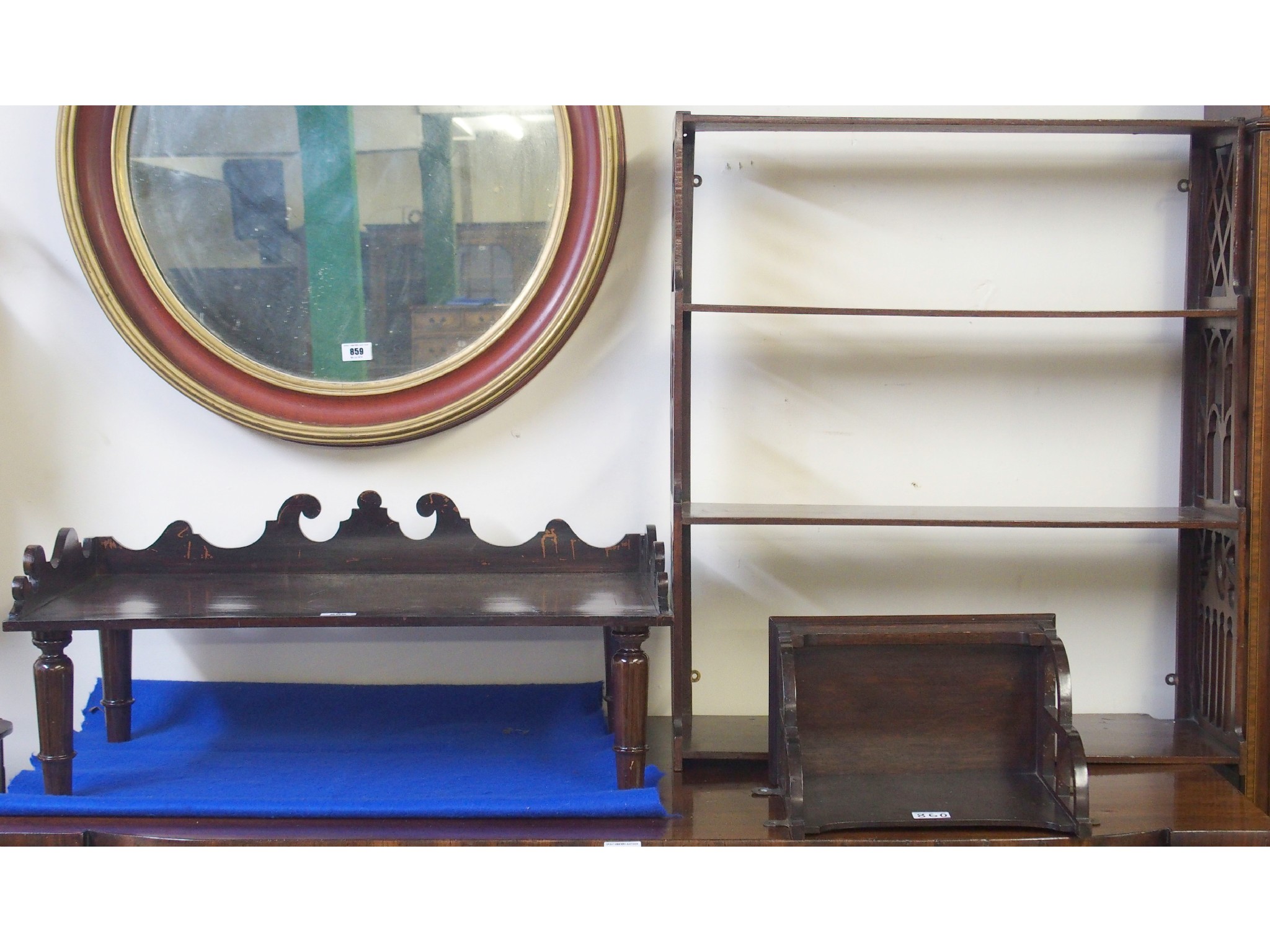 Appraisal: A stained bed tray wall bracket and four shelf wall