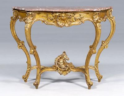 Appraisal: Italian rococo console shaped mottled brown and ivory marble top