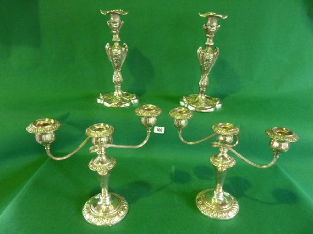 Appraisal: A pair of silver plated candelabra together with an impressive