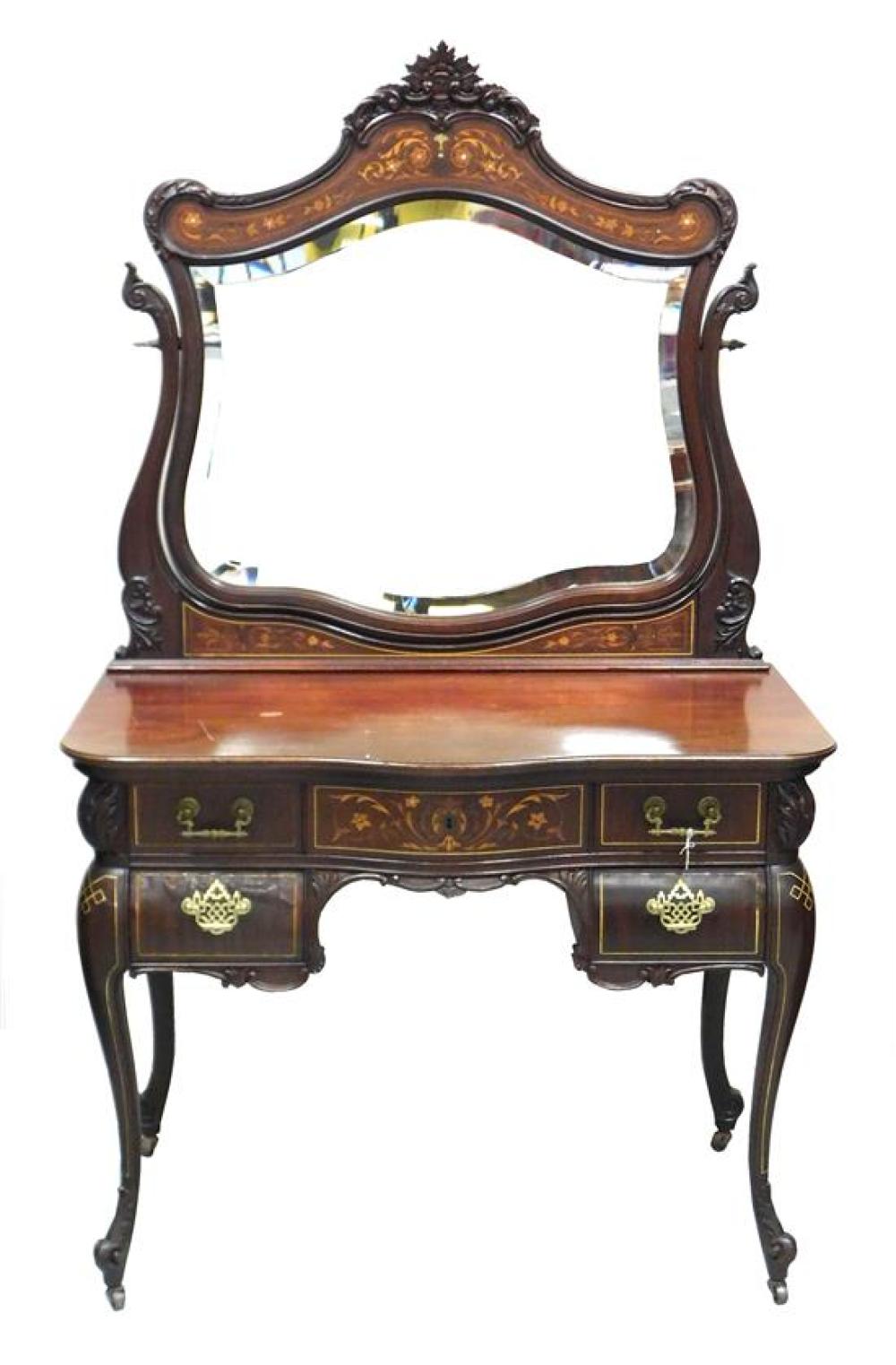 Appraisal: Baroque Revival lady''s vanity and mirror early th C mahogany