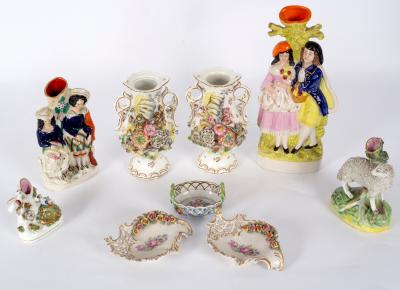 Appraisal: Two Staffordshire figures a pair of vases encrusted with flowers