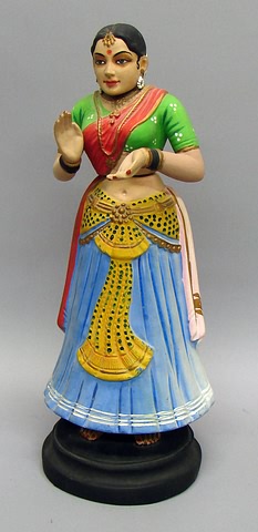 Appraisal: Female figure from India This figure is both a nodder