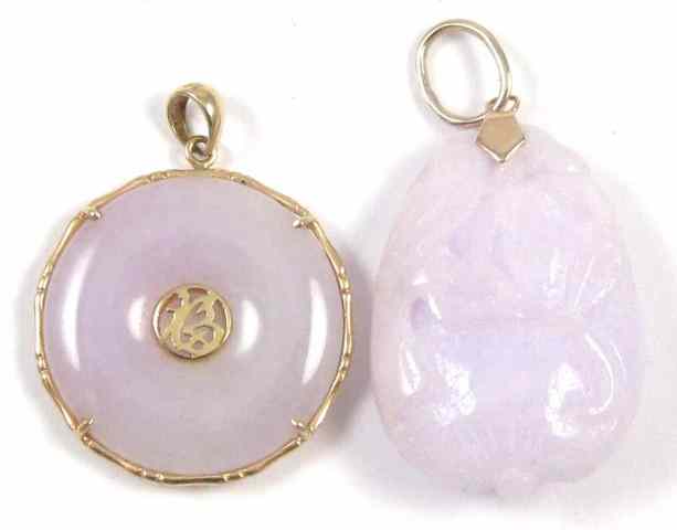 Appraisal: TWO CHINESE JADE PENDANTS one a lavender and light green