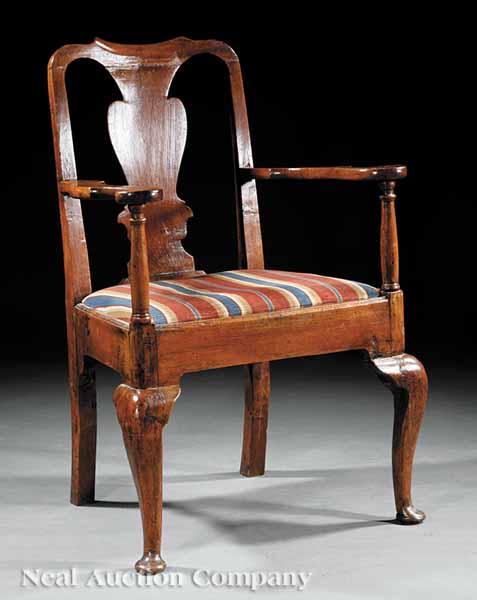 Appraisal: A Queen Anne Walnut Armchair th c shaped crest rail