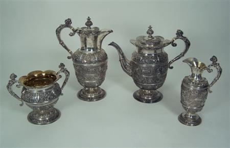 Appraisal: A matched four piece tea and coffee service retailed by