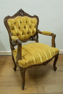 Appraisal: FRENCH UPHOLSTERED ARM CHAIR