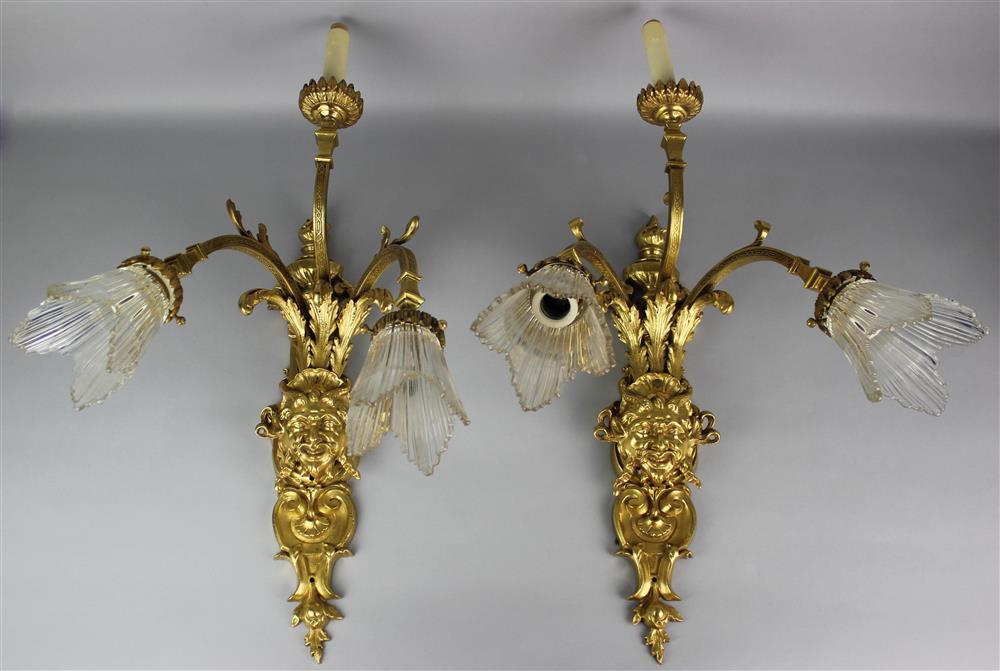 Appraisal: PAIR OF REGENCE STYLE GILT BRONZE THREE-LIGHT SCONCES each shaped