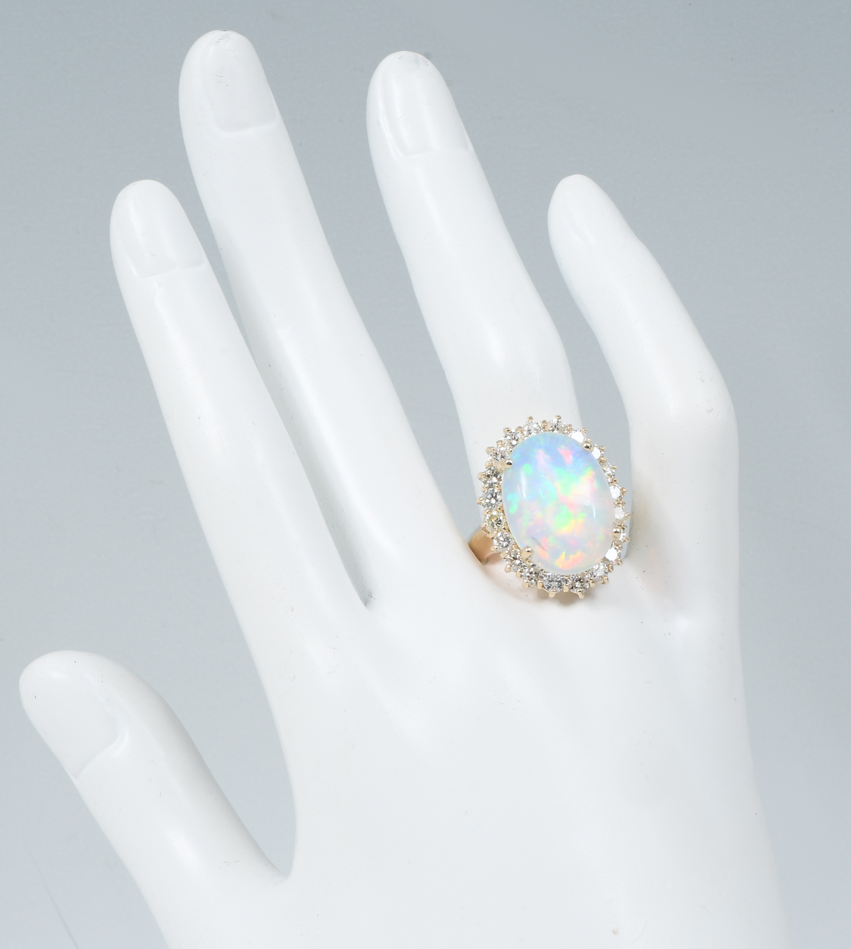 Appraisal: FIERY K CT OPAL RING WITH DIAMONDS Really beautiful and