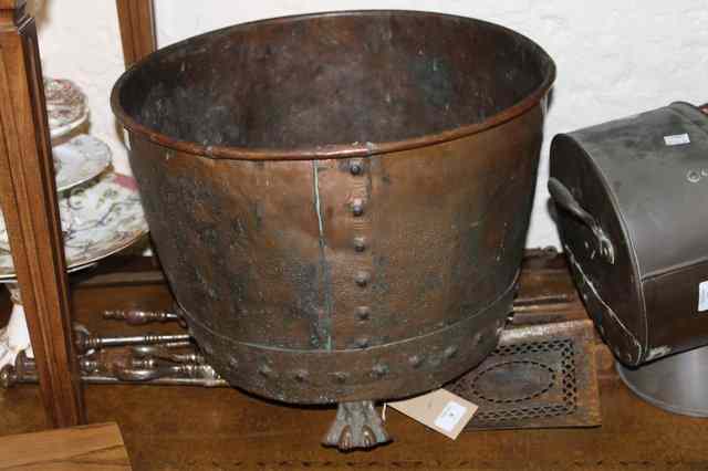 Appraisal: A LARGE VICTORIAN COPPER CAULDRON on claw feet and a