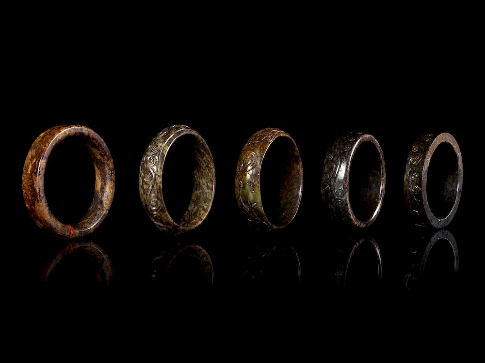 Appraisal: Five Chinese Jade Bangles Largest diam in cm Five Chinese