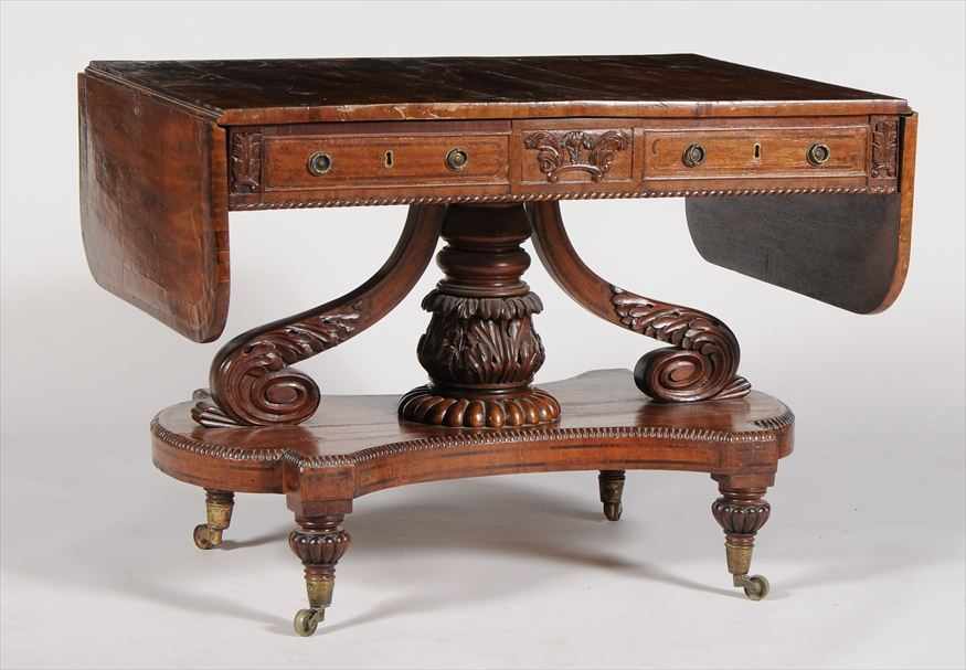 Appraisal: LATE REGENCY MAHOGANY AND ROSEWOOD-BANDED SOFA TABLE The cross banded